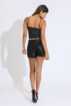 ASYMMETRICAL VEGAN LEATHER SKORT - BLACK